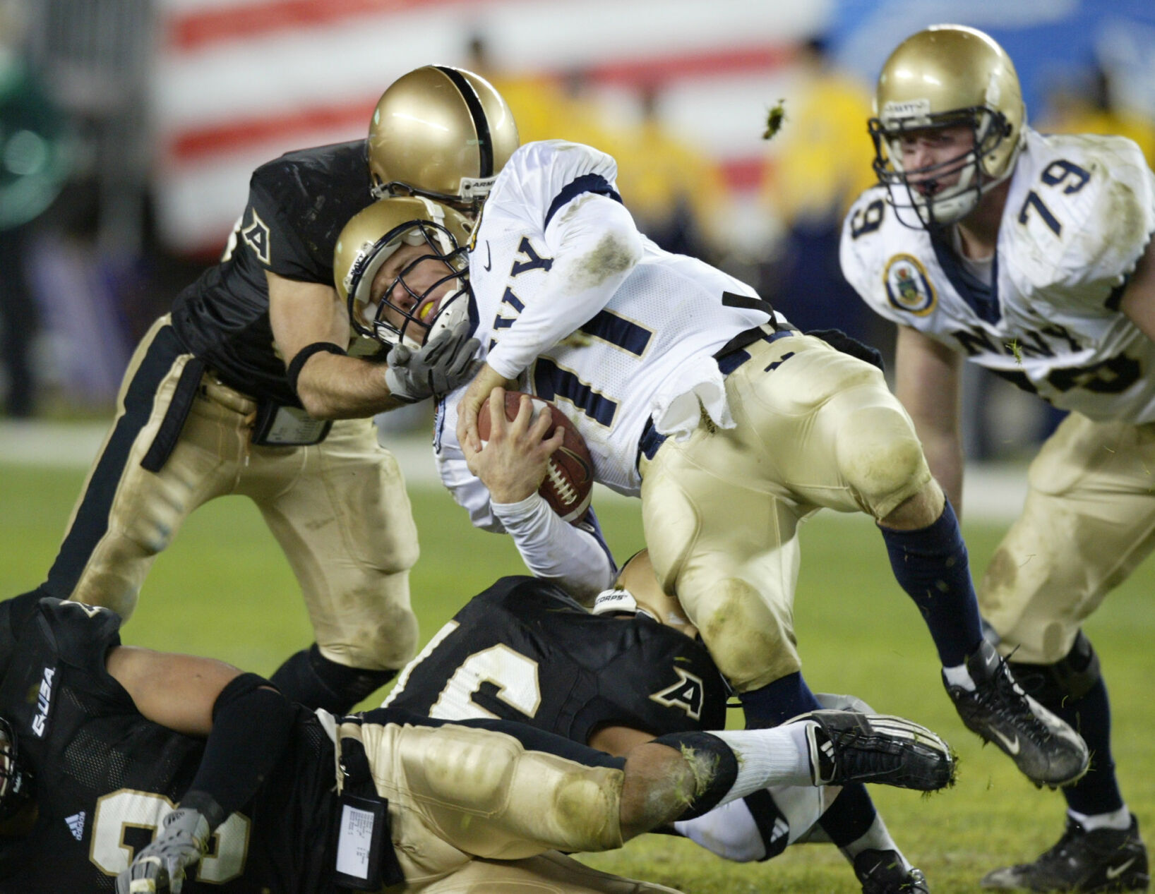2003: Army becomes first team to finish 0-13 in major college history after loss to Navy